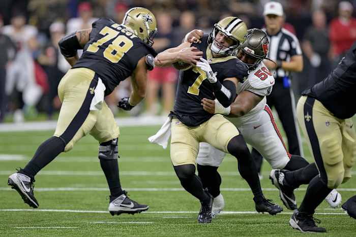 Taysom Hill (7) of the New Orleans Saints is tackled by Tampa Bay Buccaneers defensive tackle Vita Vea (50). Mandatory Credit: Matthew Hinton-USA TODAY